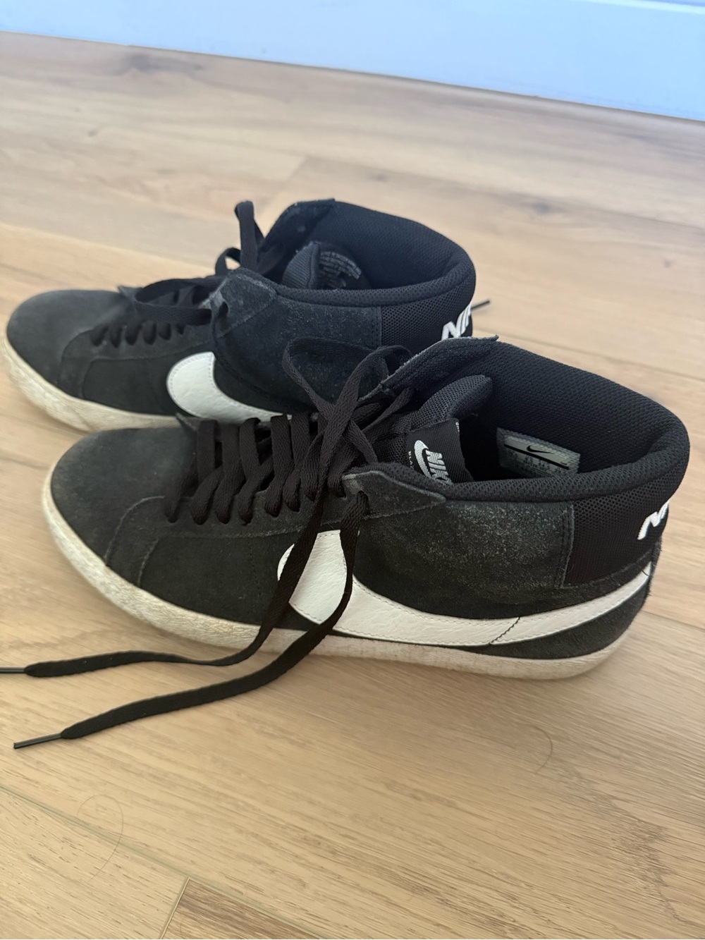 Nike Black and White Mid-Top Swoosh Sneakers